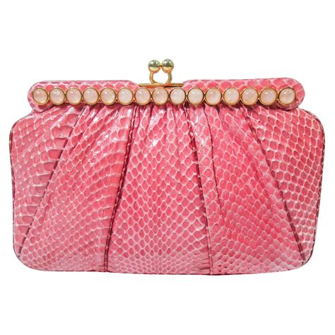 pink snakeskin clutch bag